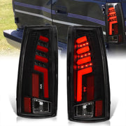 Chevrolet C/K 1988-1999 / Suburban 1992-1999 / Tahoe 1995-1999 / Blazer Full Size 1992-1994 / GMC C/K 1988-1999 / Yukon 1992-1999 / Cadillac Escalade 1999-2000 LED Bar Tail Lights Black Housing Clear Len Red Tube - Parts Agent